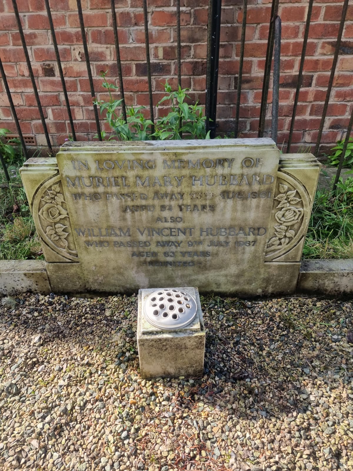 Before restoration - overgrown and neglected grave